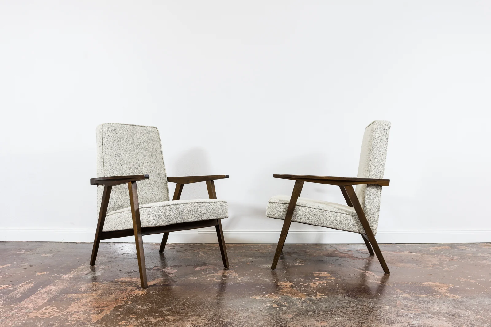 Pair of armchairs, beech wood, Poland, 1960s