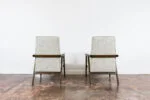 Pair of armchairs, beech wood, Poland, 1960s