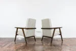 Pair of armchairs, beech wood, Poland, 1960s