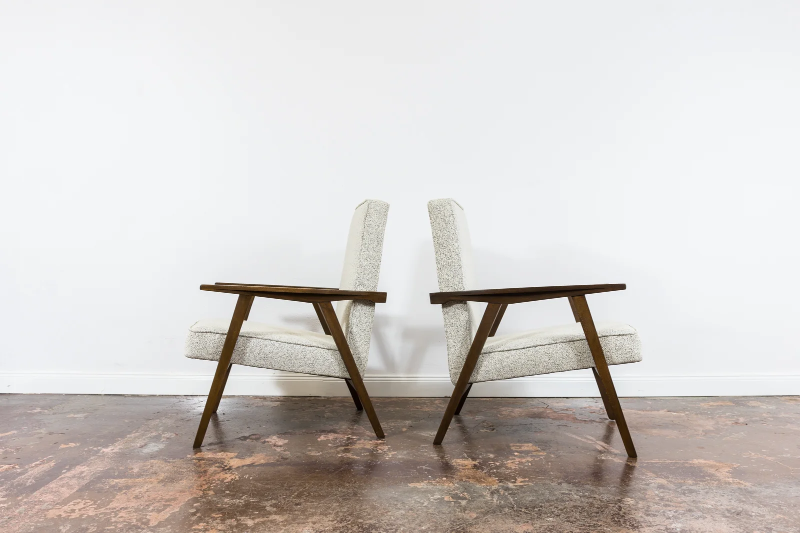 Pair of armchairs, beech wood, Poland, 1960s