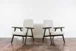Pair of armchairs, beech wood, Poland, 1960s