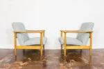 Pair of GFM-142 Armchairs, designed by Edmund Homa, Gościcińska Fabryka Mebli, Poland, 1960s