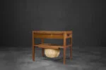 Teak table with drawer and woven basket, Denmark, 1960s
