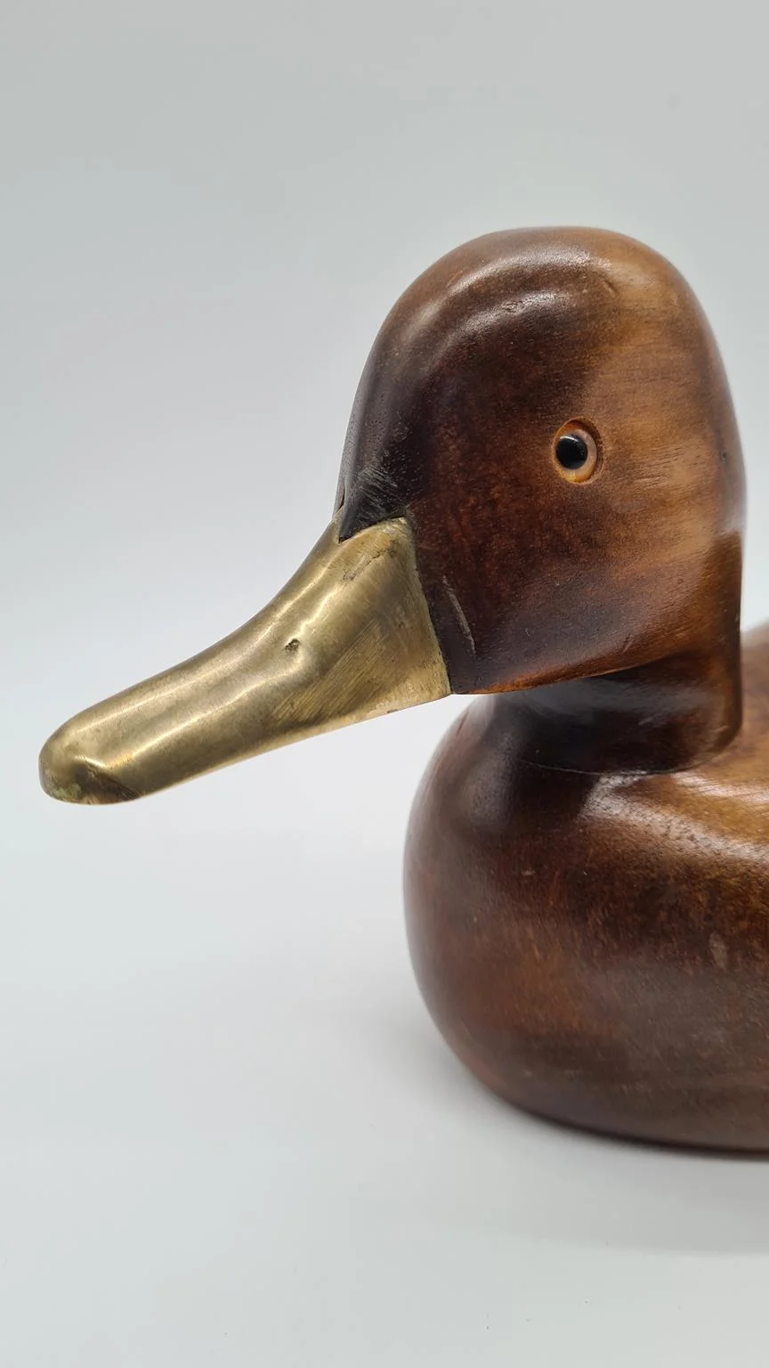 Hand-carved duck with brass and glass elements, Germany, 1960s/70s