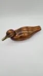 Hand-carved duck with brass and glass elements, Germany, 1960s/70s
