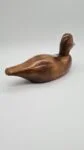 Hand-carved duck with brass and glass elements, Germany, 1960s/70s