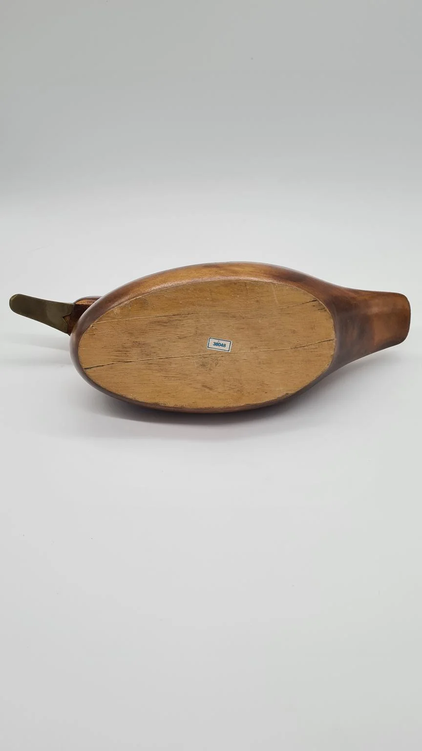 Hand-carved duck with brass and glass elements, Germany, 1960s/70s