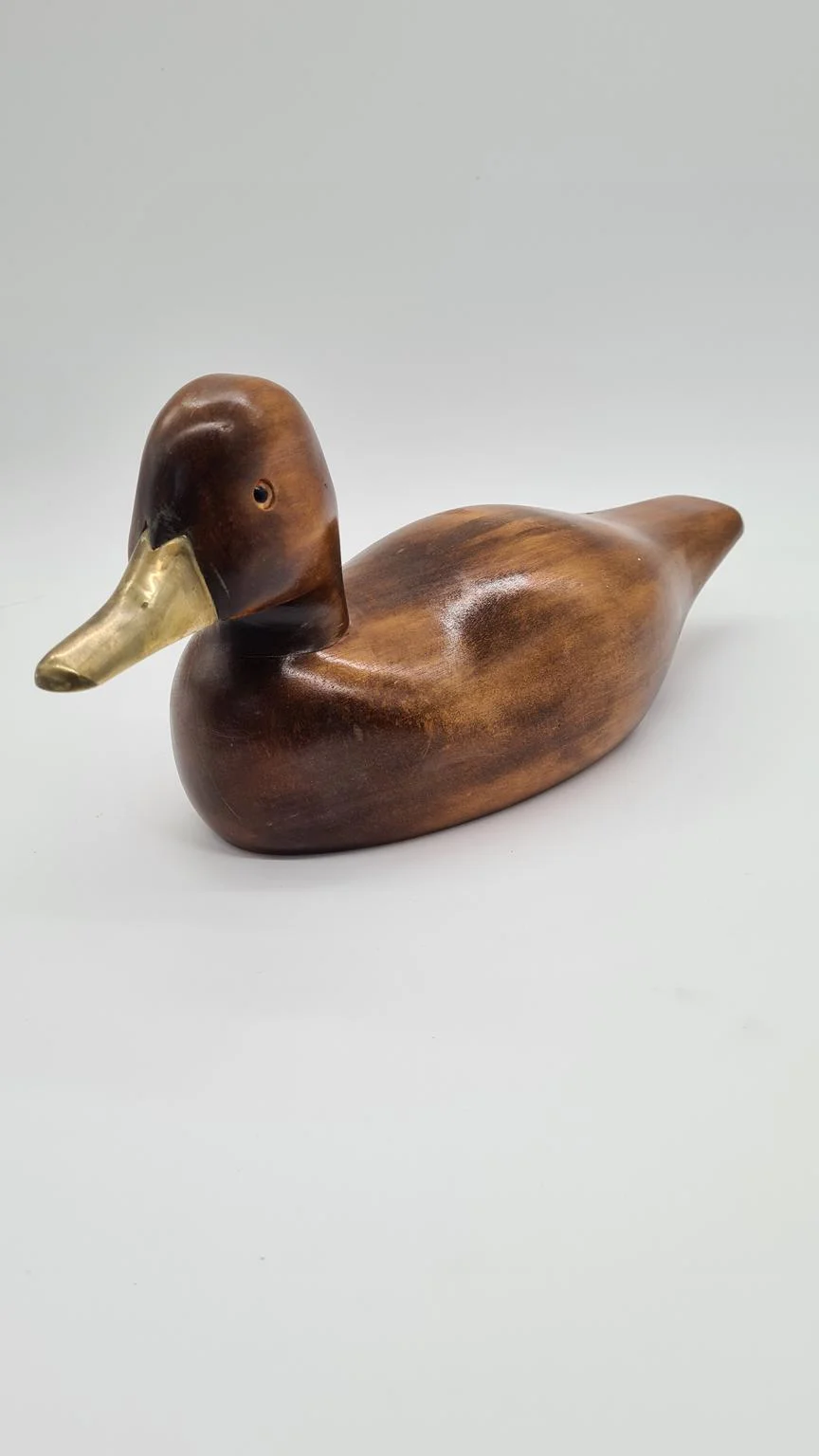 Hand-carved duck with brass and glass elements, Germany, 1960s/70s