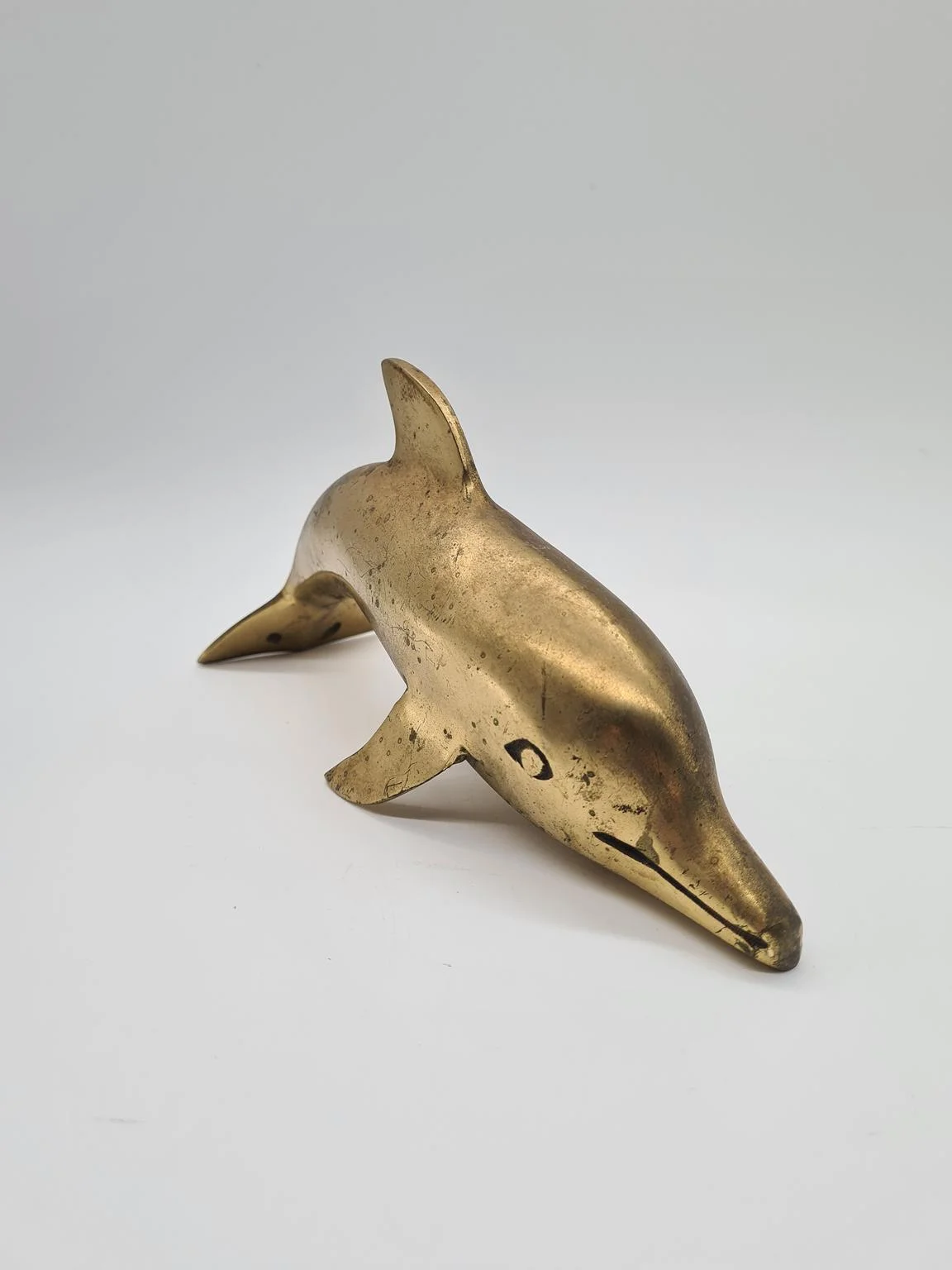 Brass dolphin figurine, 1970s