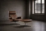 Leather swivel armchair with footstool, Denmark, 1970s