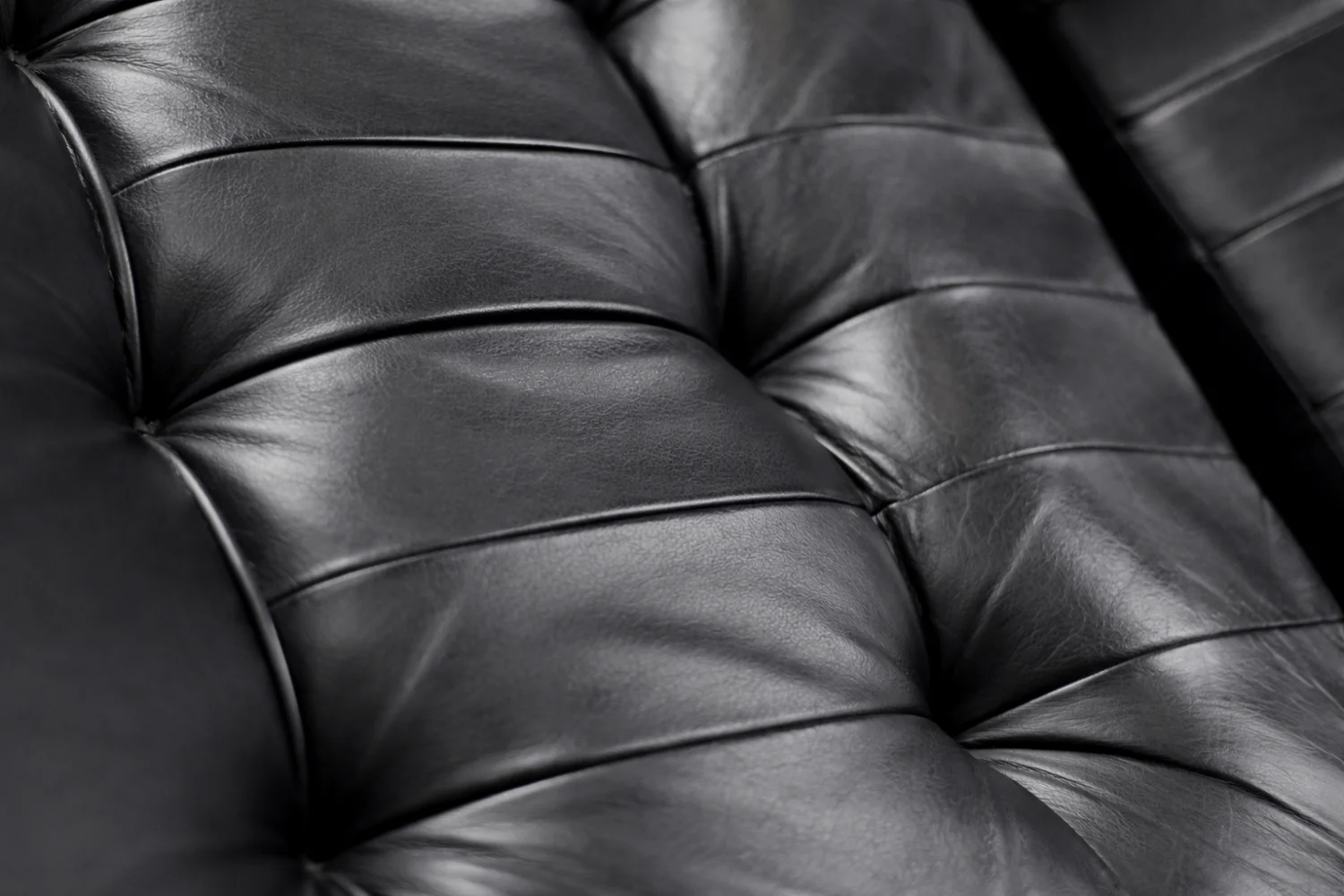 Modernist swivel armchair with footstool, Unico, Denmark, 1970s