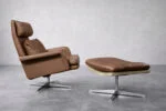 Leather swivel armchair with footstool, Denmark, 1970s