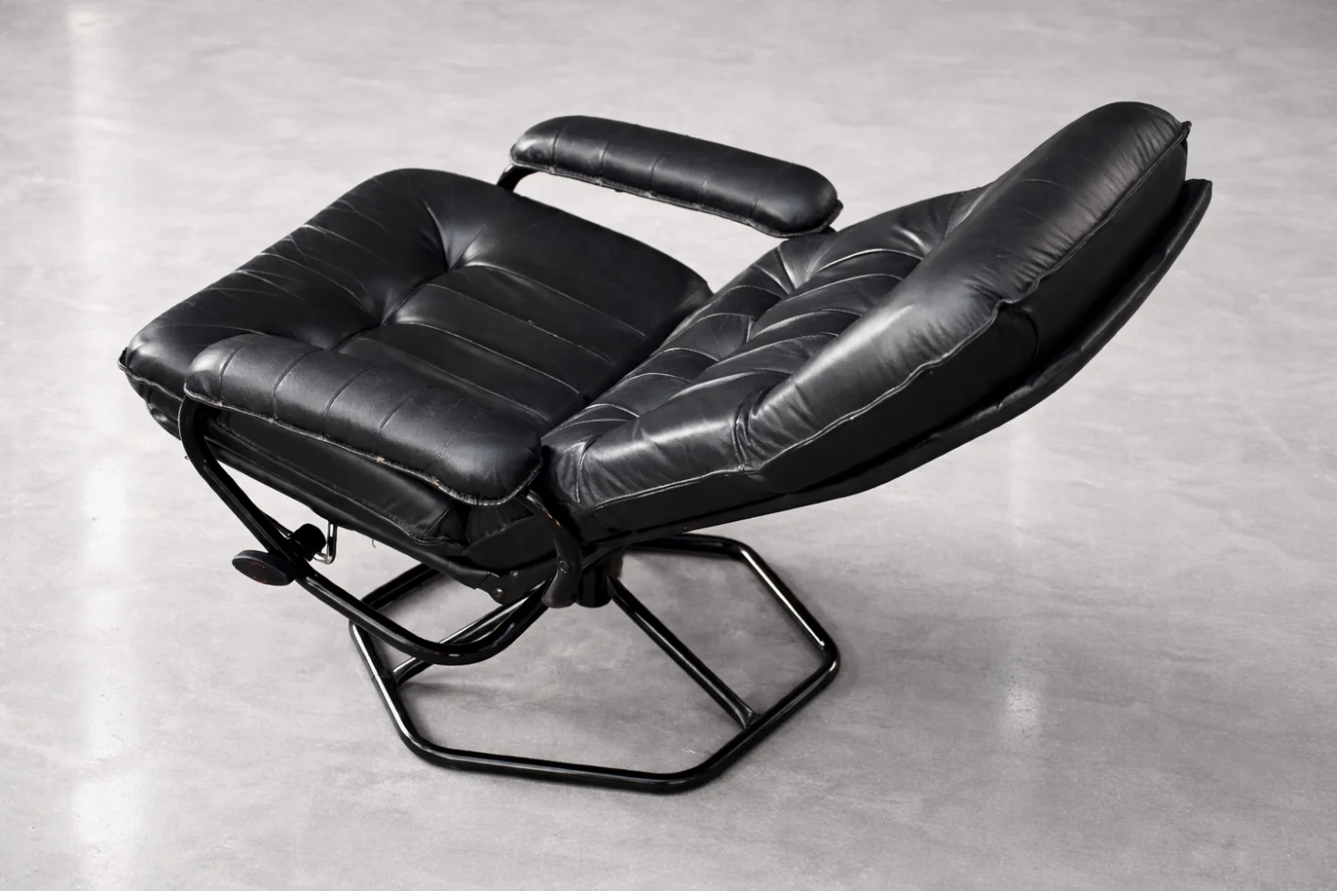 Modernist swivel armchair with footstool, Unico, Denmark, 1970s