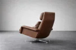 Leather swivel armchair with footstool, Denmark, 1970s