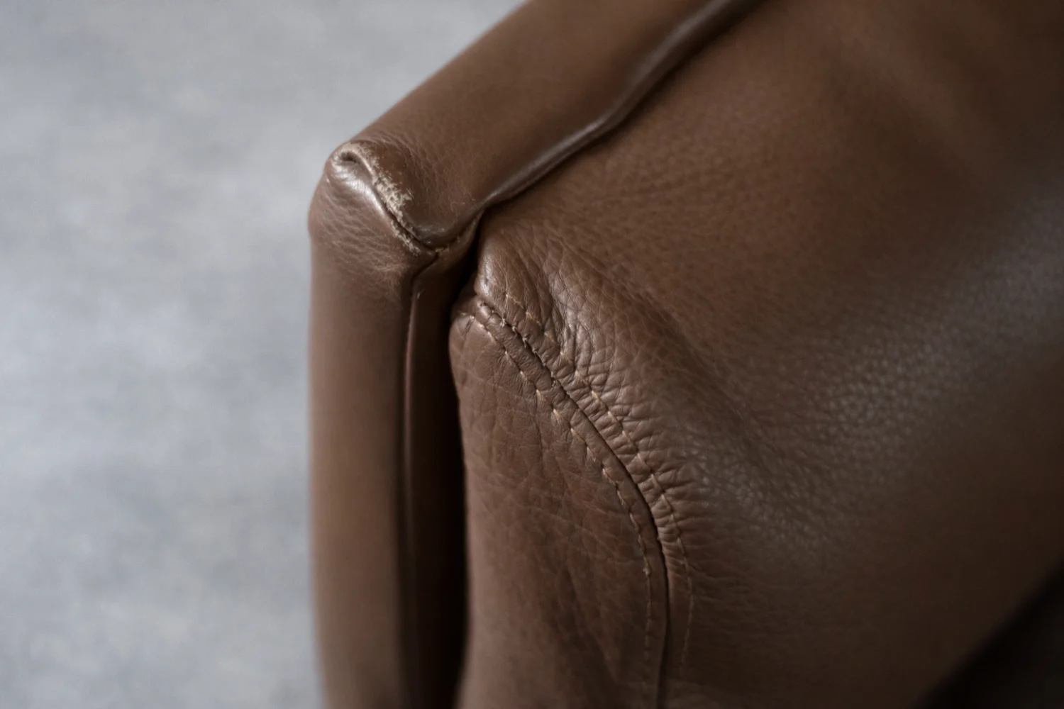 Leather swivel armchair with footstool, Denmark, 1970s