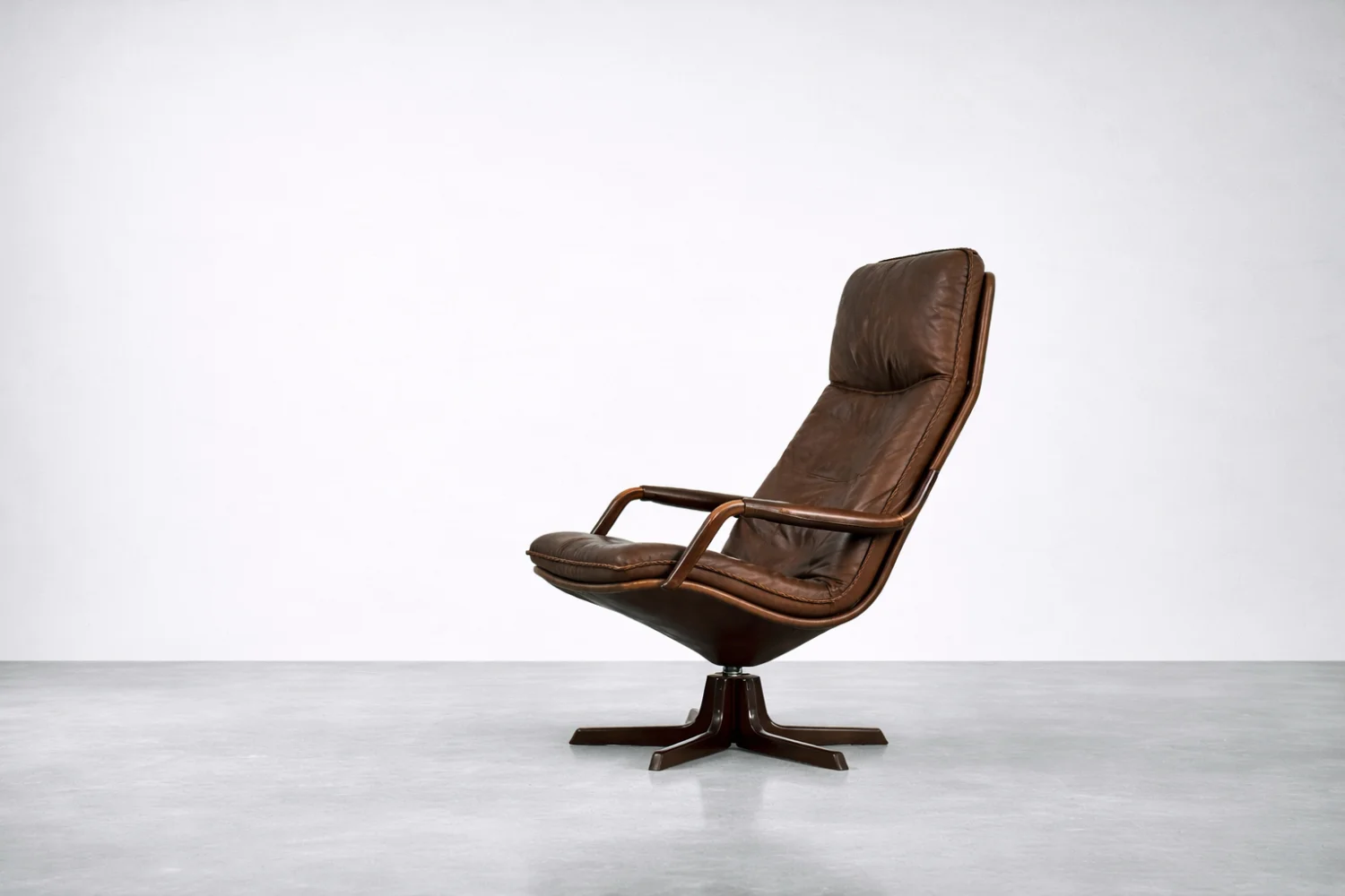 Leather armchair with footstool, Berg Furniture, Denmark, 1970s