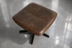 Leather armchair with footstool, Berg Furniture, Denmark, 1970s