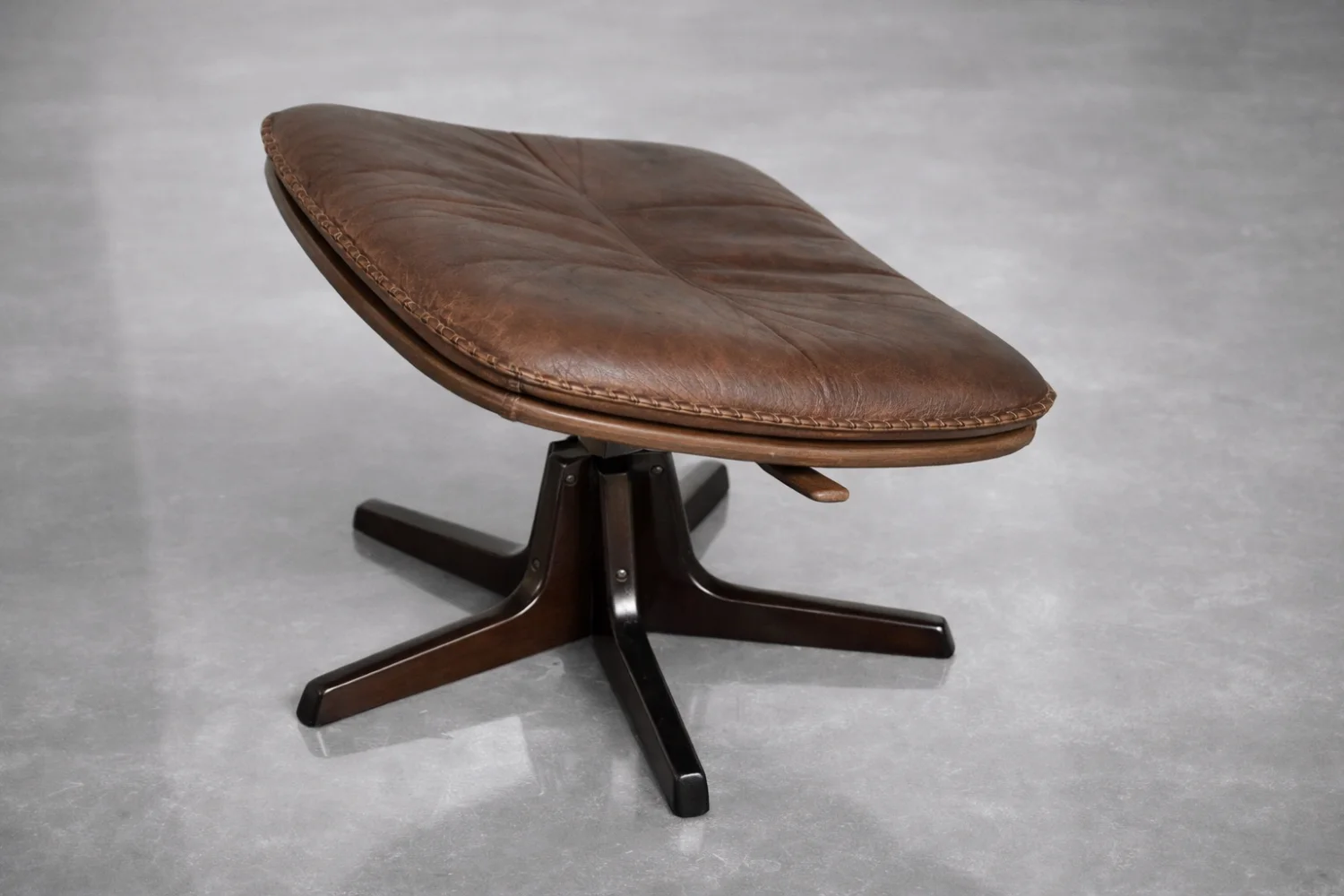Leather armchair with footstool, Berg Furniture, Denmark, 1970s