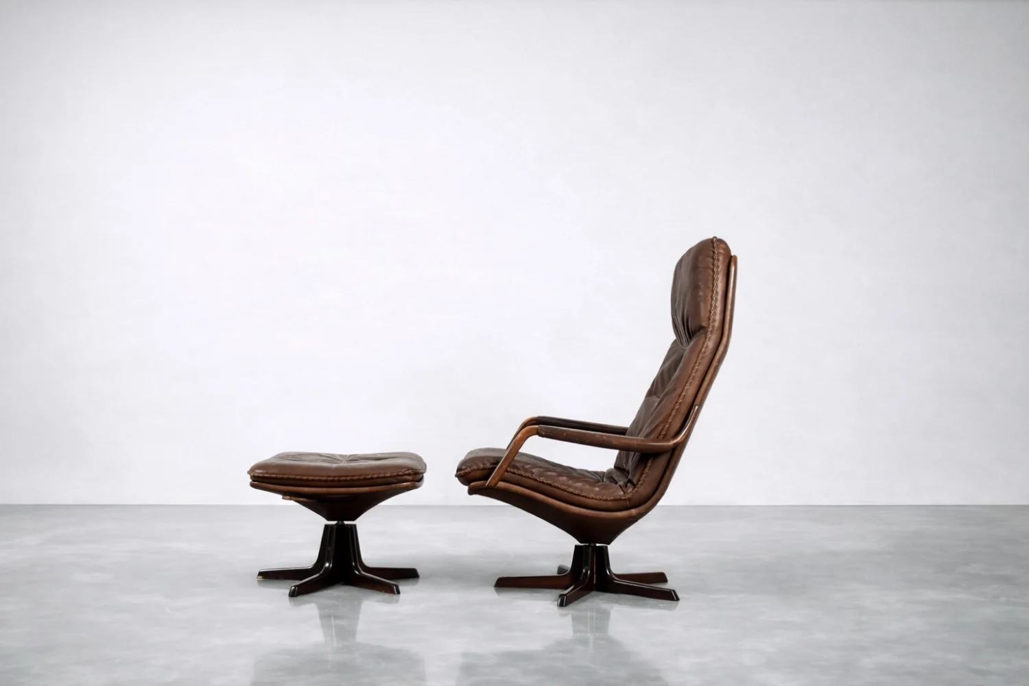 Leather armchair with footstool, Berg Furniture, Denmark, 1970s