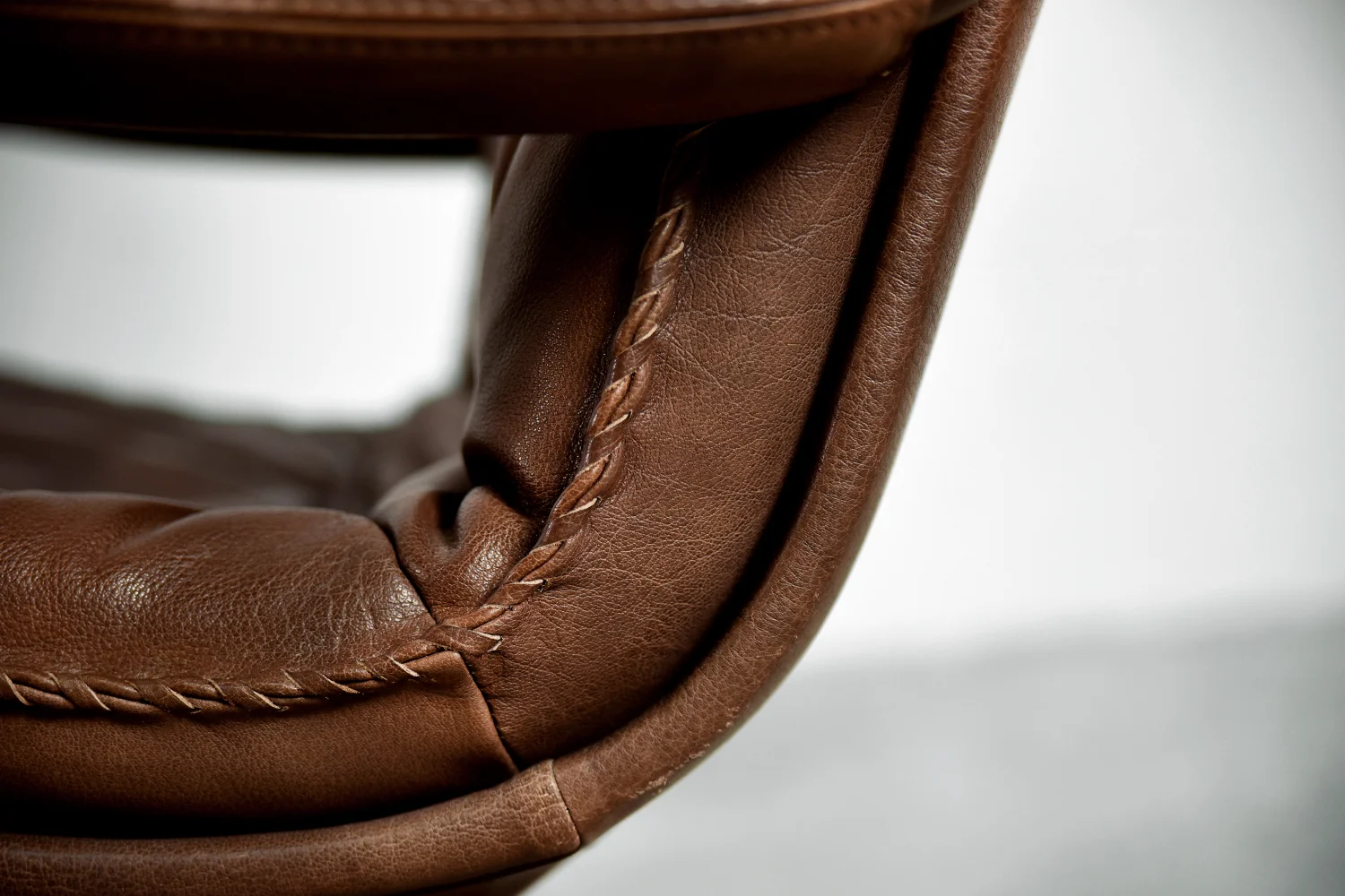 Leather armchair with footstool, Berg Furniture, Denmark, 1970s
