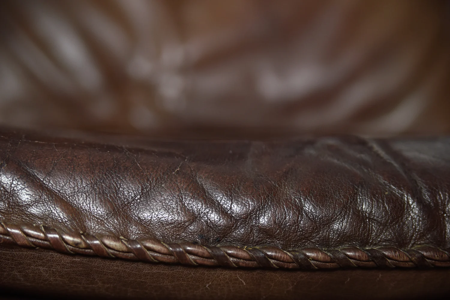 Leather armchair with footstool, Berg Furniture, Denmark, 1970s