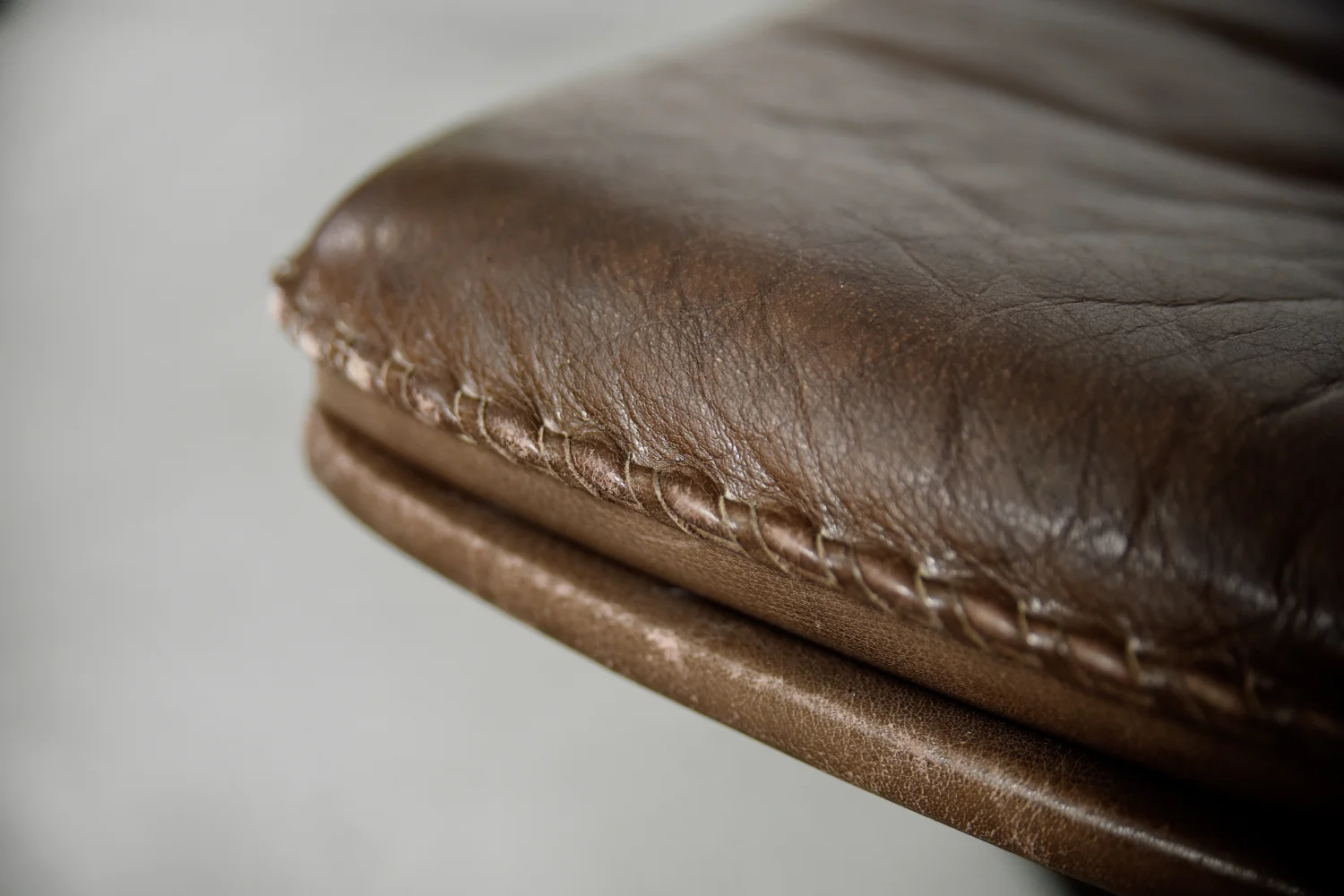 Leather armchair with footstool, Berg Furniture, Denmark, 1970s