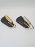 Modernist brass and aluminium wall lights, 1970s