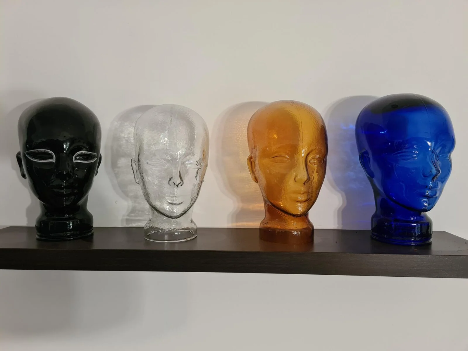 Display heads made of coloured glass, 1970s