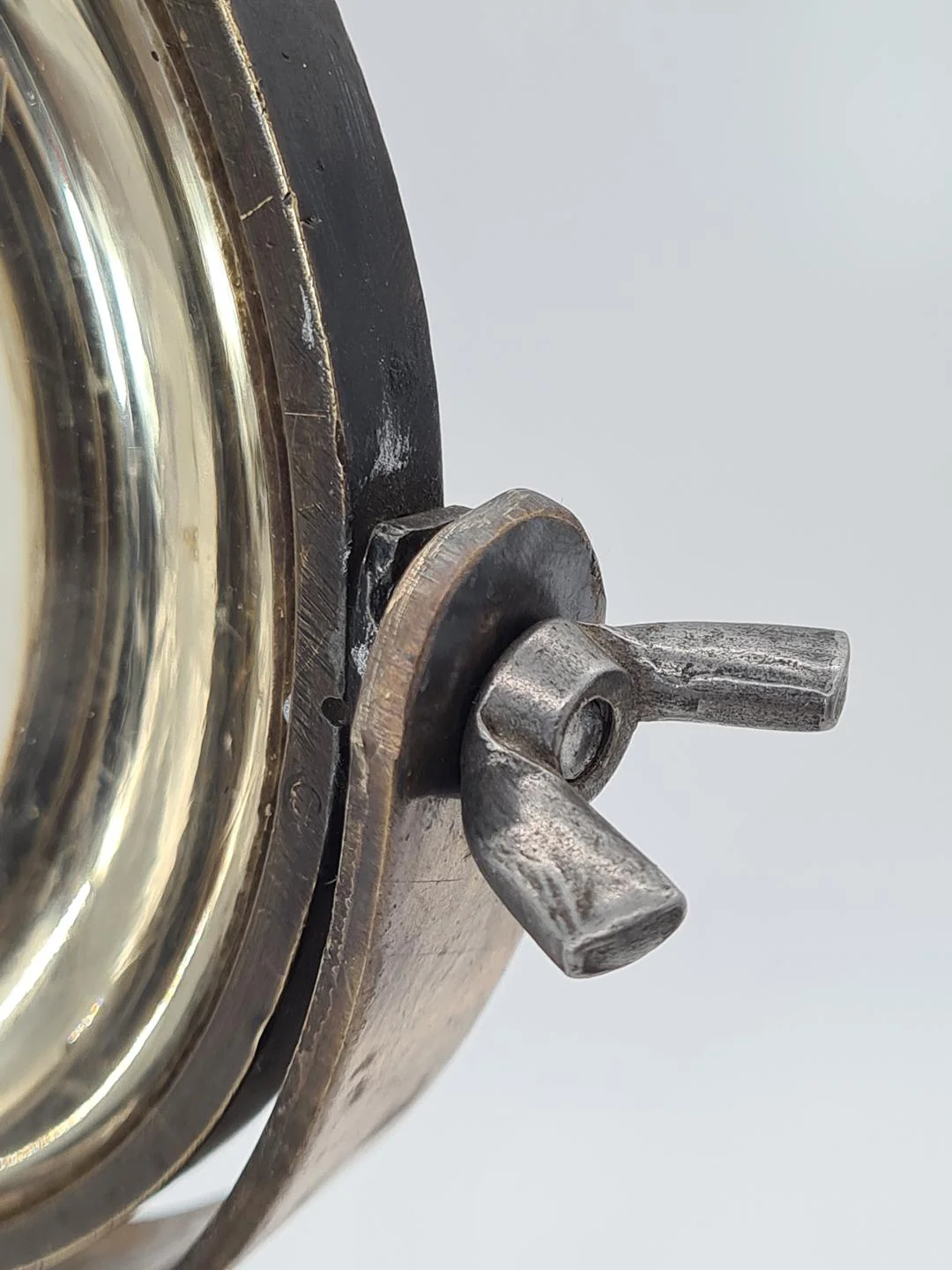 Optical lens on a cast iron stand, 19th century