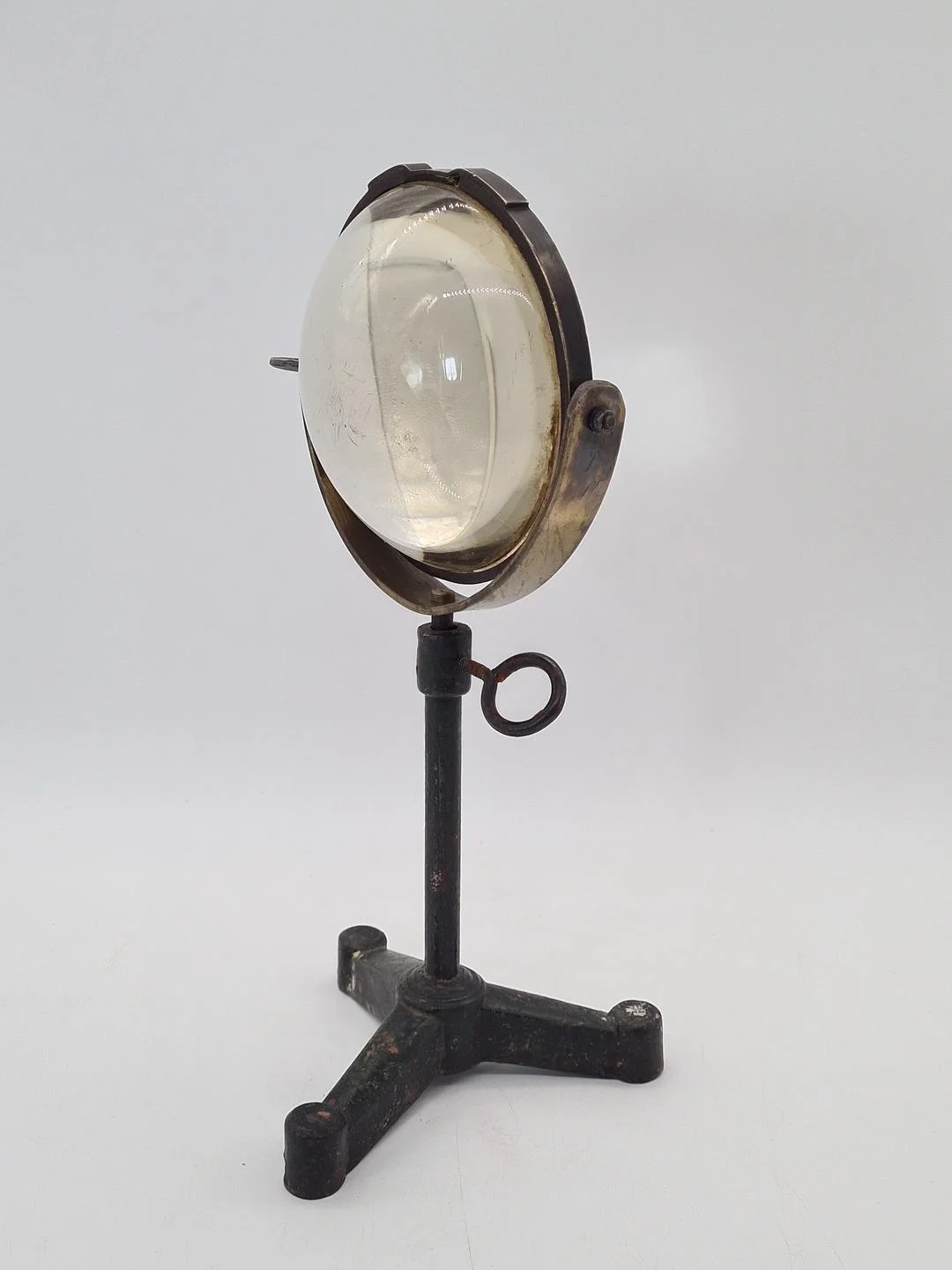Optical lens on a cast iron stand, 19th century
