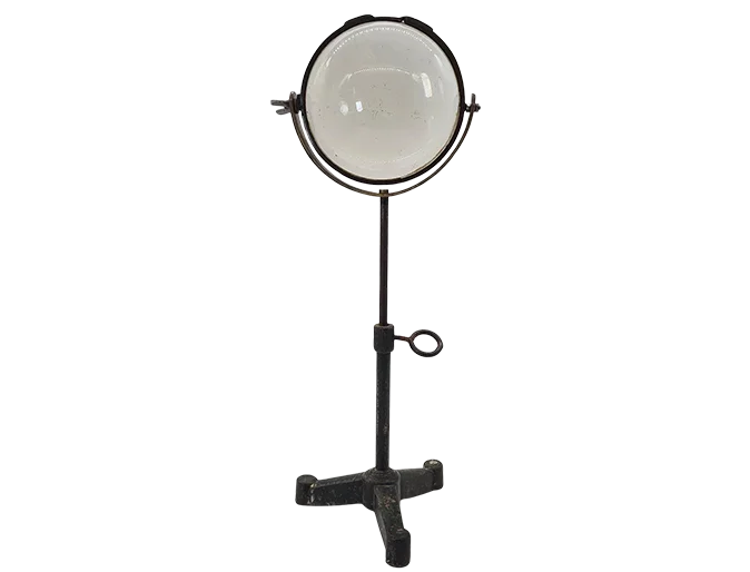 Optical lens on a cast iron stand, 19th century