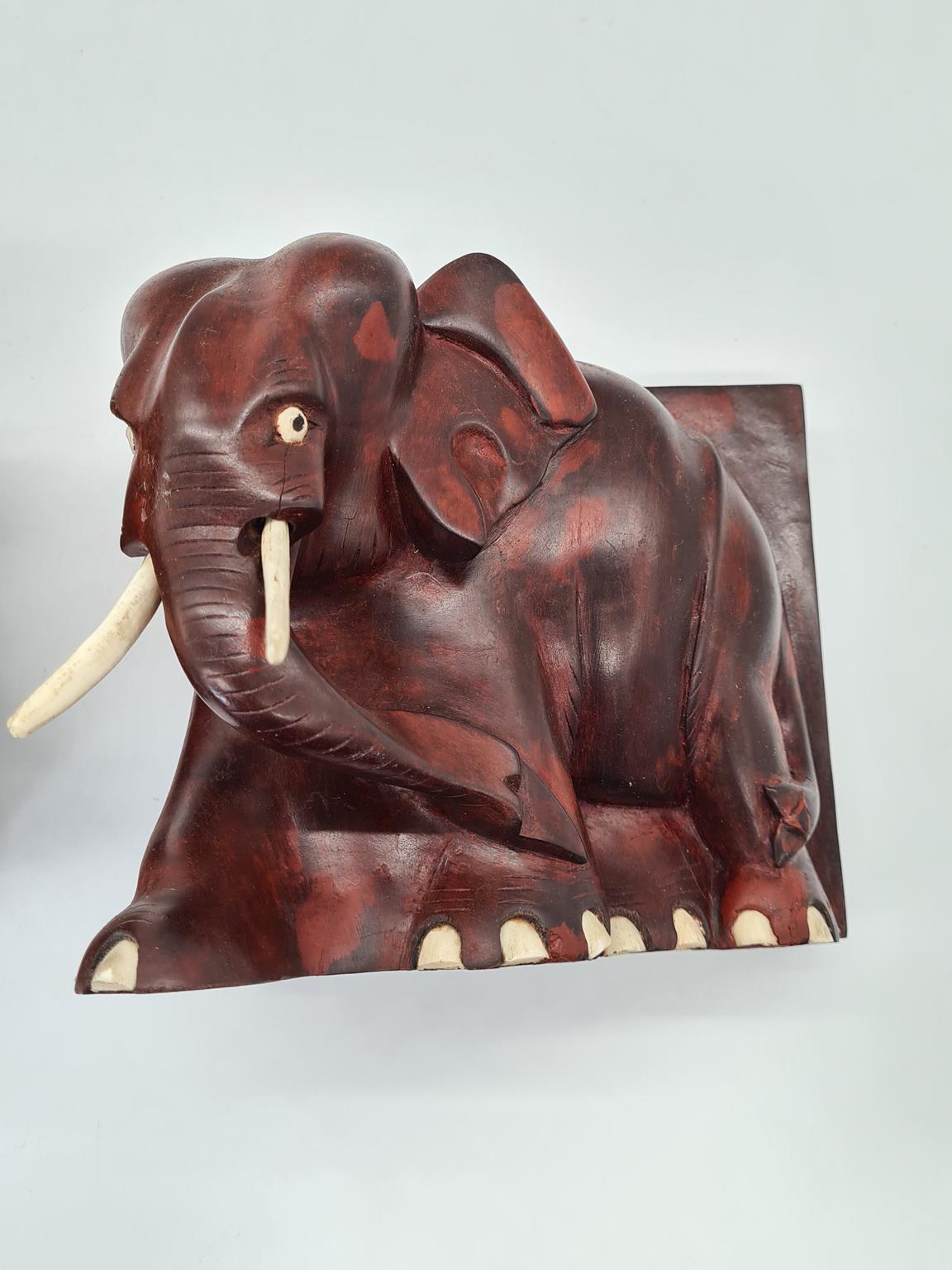 Vintage carved elephant-shaped bookends