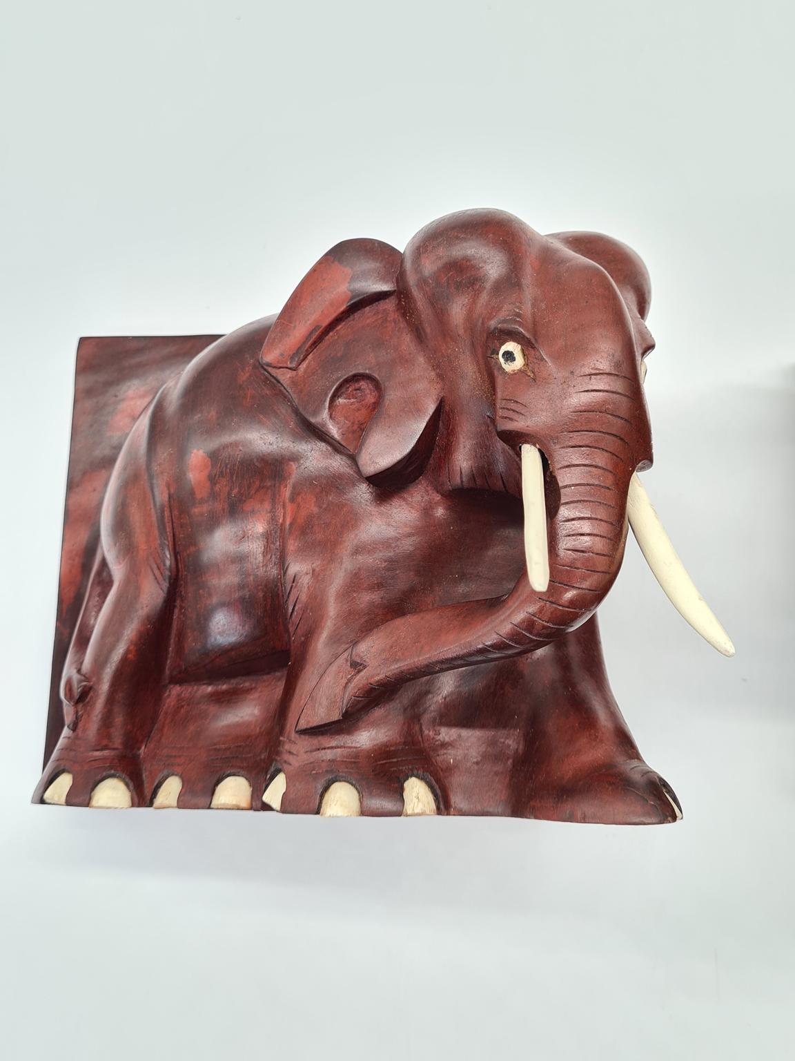 Vintage carved elephant-shaped bookends