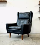 Leather wingback armchair, Denmark, 1970s