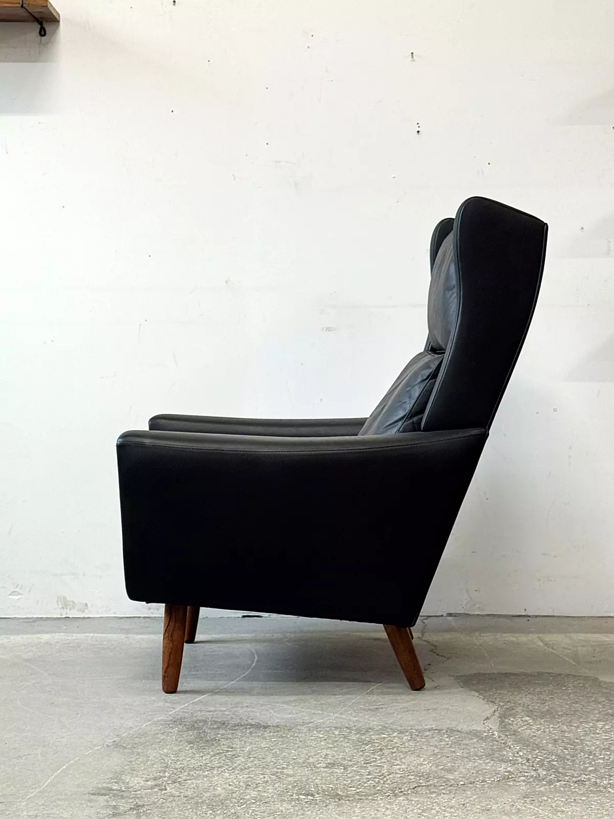 Leather wingback armchair, Denmark, 1970s