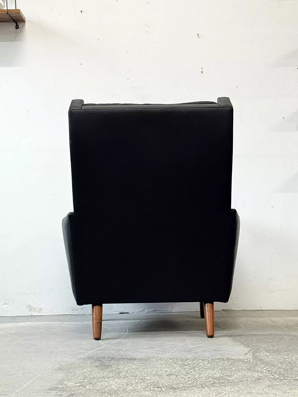 Leather wingback armchair, Denmark, 1970s