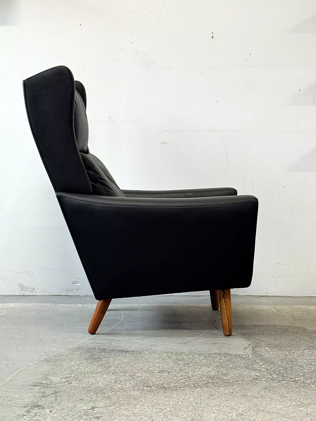 Leather wingback armchair, Denmark, 1970s