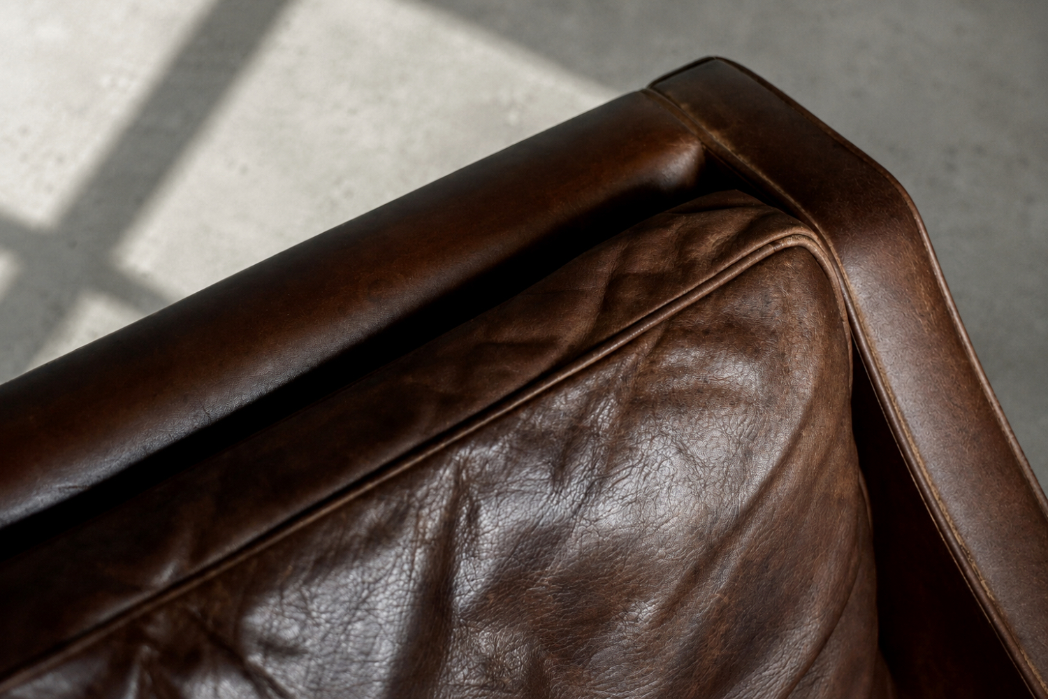 Leather lounge chair with footstool, model 2207, designed by Børge Mogensen, Fredericia, Denmark, 1960s