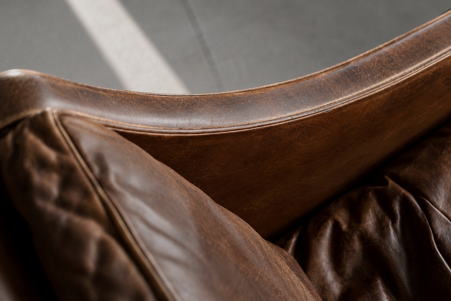 Leather lounge chair with footstool, model 2207, designed by Børge Mogensen, Fredericia, Denmark, 1960s
