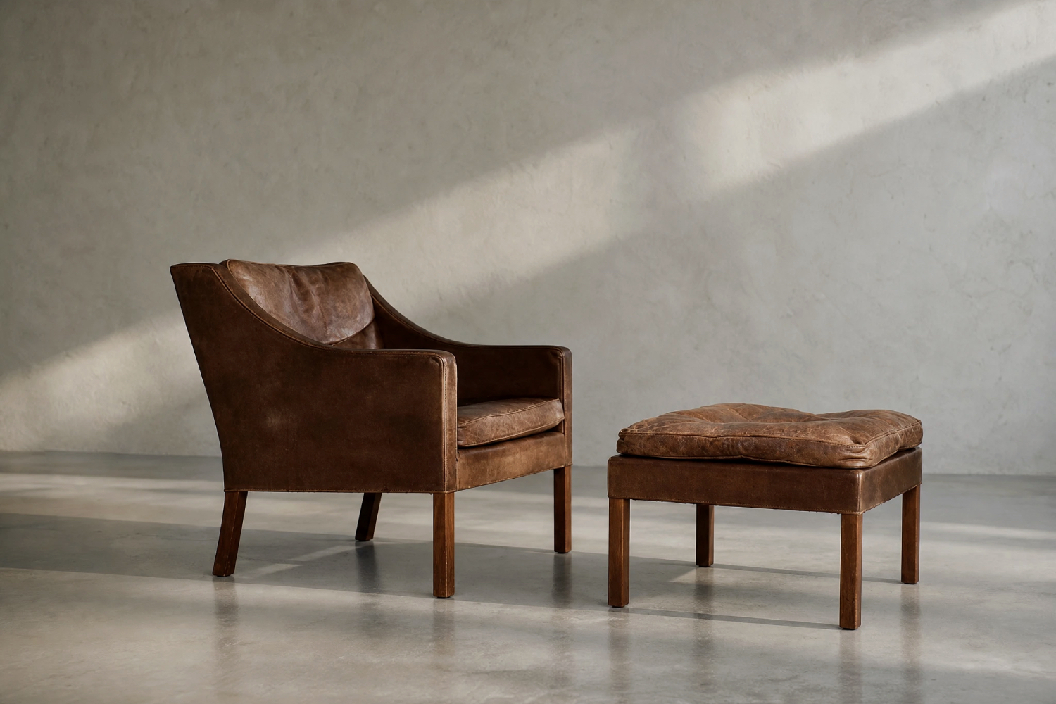 Leather lounge chair with footstool, model 2207, designed by Børge Mogensen, Fredericia, Denmark, 1960s