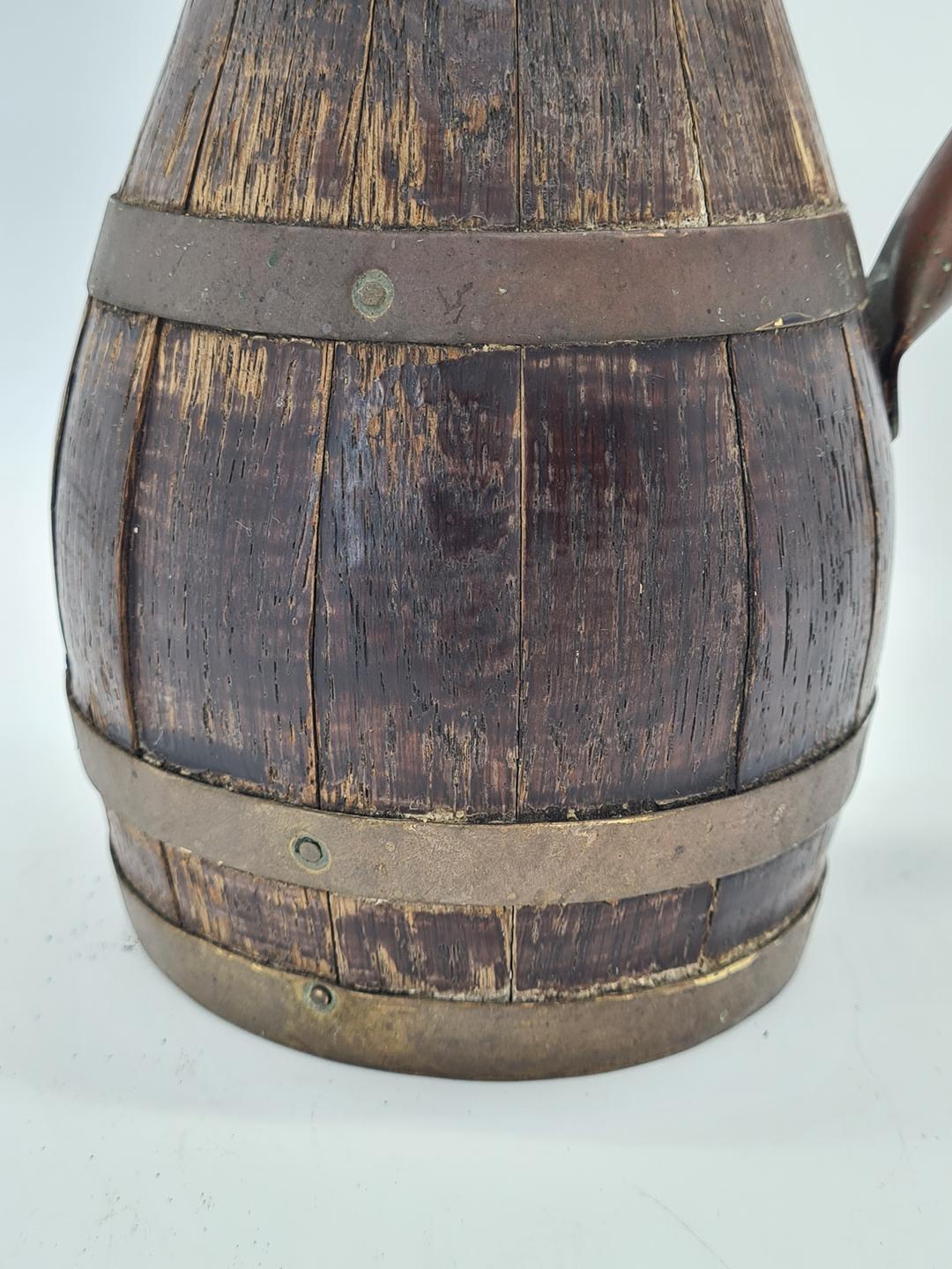 Wooden barrel-shaped jug with brass hoops, 19th/20th century