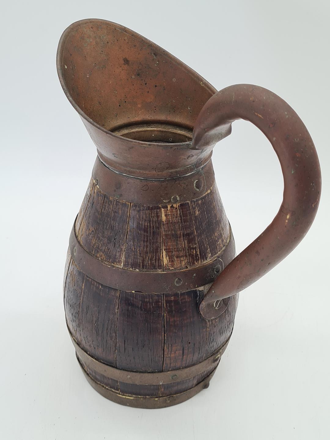 Wooden barrel-shaped jug with brass hoops, 19th/20th century