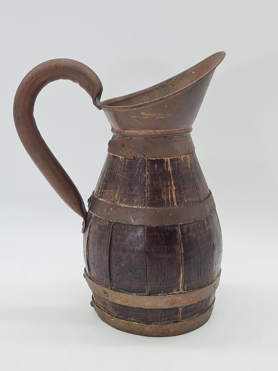 Wooden barrel-shaped jug with brass hoops, 19th/20th century