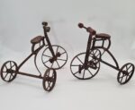 Set of 2 vintage miniature metal tricycles, 1970s
