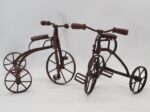 Set of 2 vintage miniature metal tricycles, 1970s