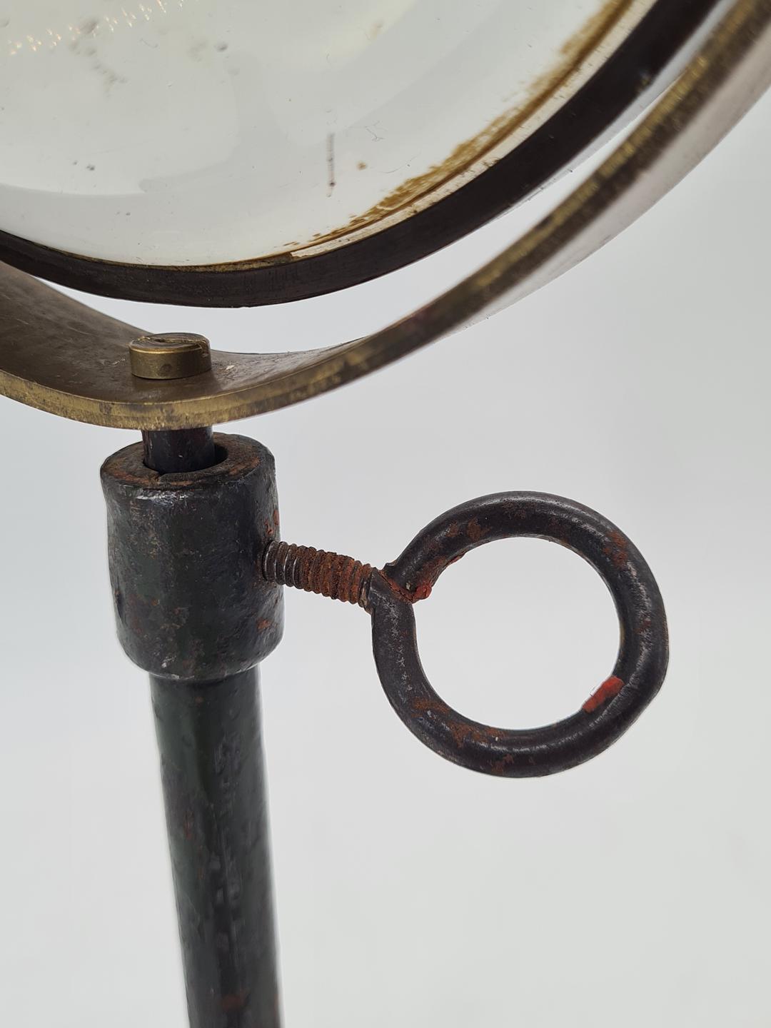 Optical lens on a cast iron stand, 19th century