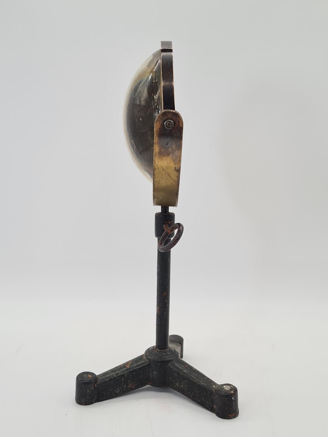 Optical lens on a cast iron stand, 19th century